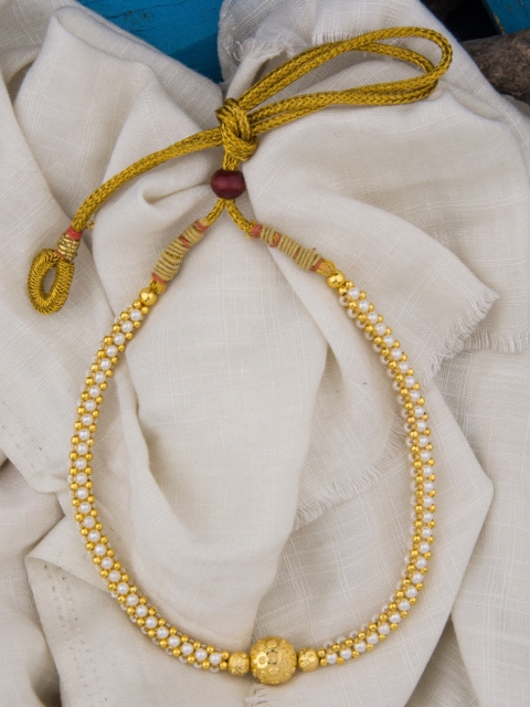 

Alankruthi Gold-Toned & White Pearl & Beaded Thushi Traditional Necklace