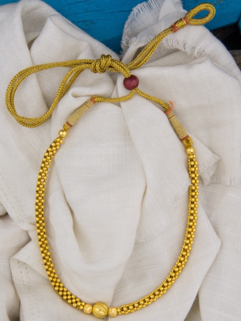 

Alankruthi Gold-Toned Thushi 3 Layer Beads Necklace