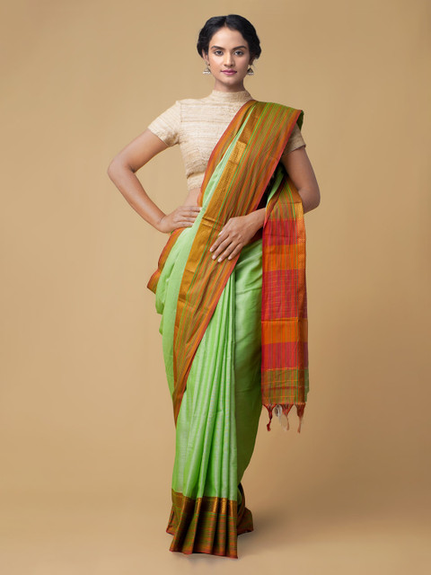 

Unnati Silks Green Pure Cotton Solid Handloom Narayan Peth Saree