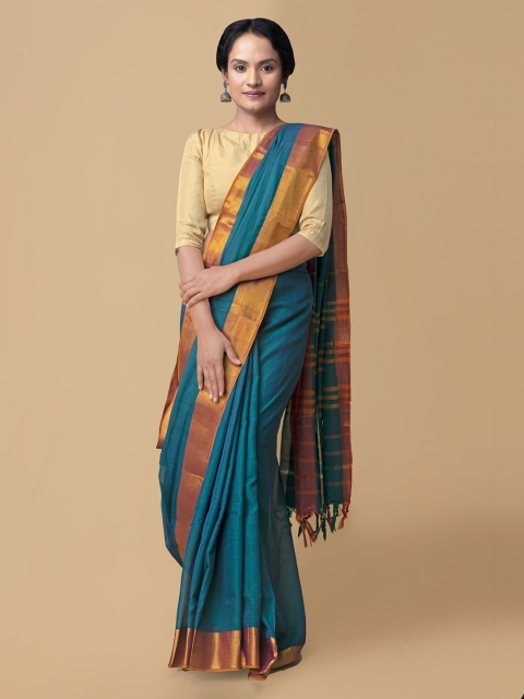 

Unnati Silks Teal Pure Cotton Solid Handloom Narayan Peth Saree