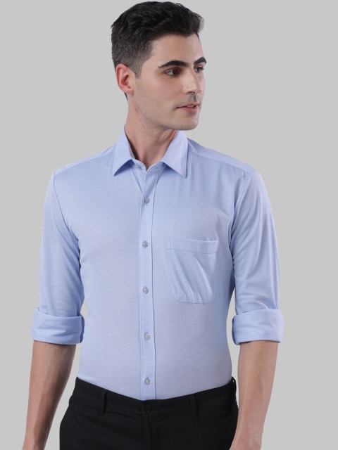 

Raymond Men Blue Regular Fit Solid Casual Shirt