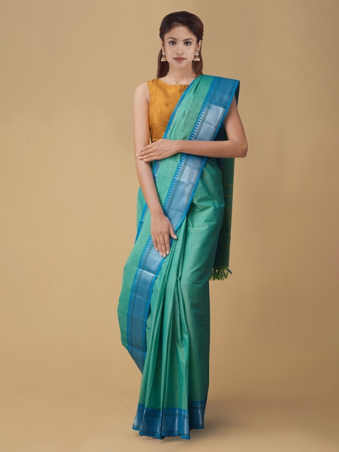 

Unnati Silks Green Woven Design Pure Venkatgiri Cotton Saree