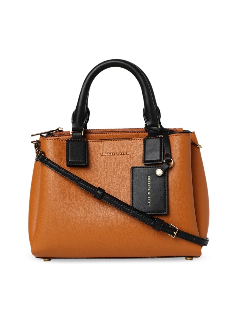 

CHARLES & KEITH Tan Brown Solid Handheld Bag