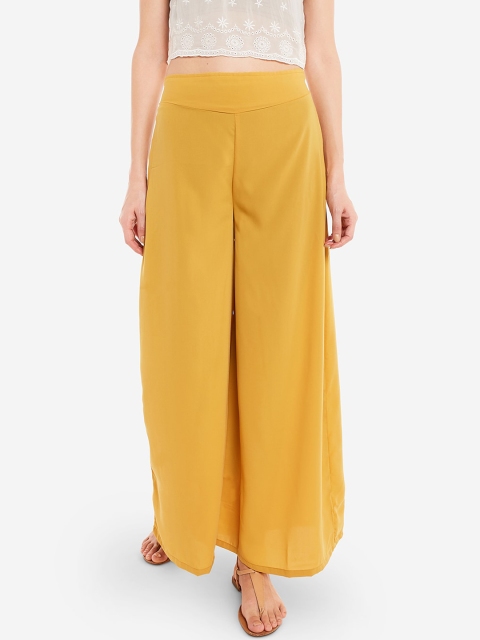 

Desi Weavess Women Yellow Solid Flared Fit Palazzos