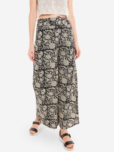 

Desi Weavess Women Black & Yellow Printed Palazzo