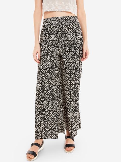 

Desi Weavess Women Black & Yellow Printed Palazzo