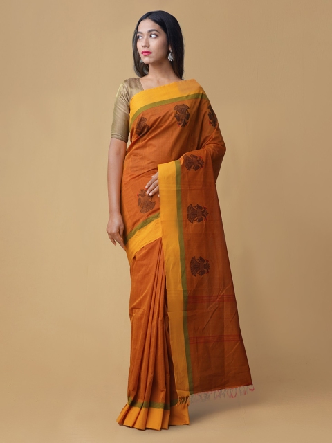 

Unnati Silks Orange Printed Pure Kanchi Cotton Saree