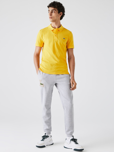 

Lacoste Men Yellow Solid Polo Collar T-shirt