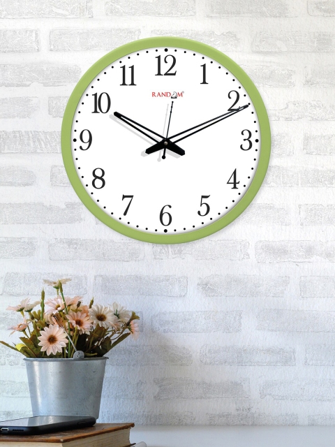 

RANDOM Green & White Elephant Font Round Shaped Wall Clock