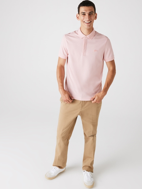 

Lacoste Men Pink Solid Round Neck T-shirt