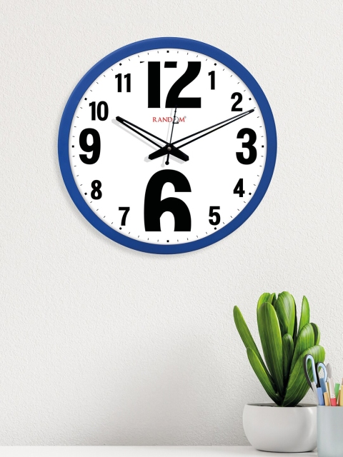 

RANDOM Blue & White Side Cut Round Shaped Wall Clock