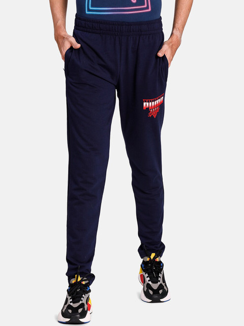 

Puma Men Navy Blue Solid Straight Fit Worldwide Graphic Track Pants