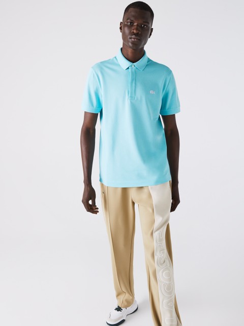 

Lacoste Men Turquoise Blue Solid Polo Collar T-shirt