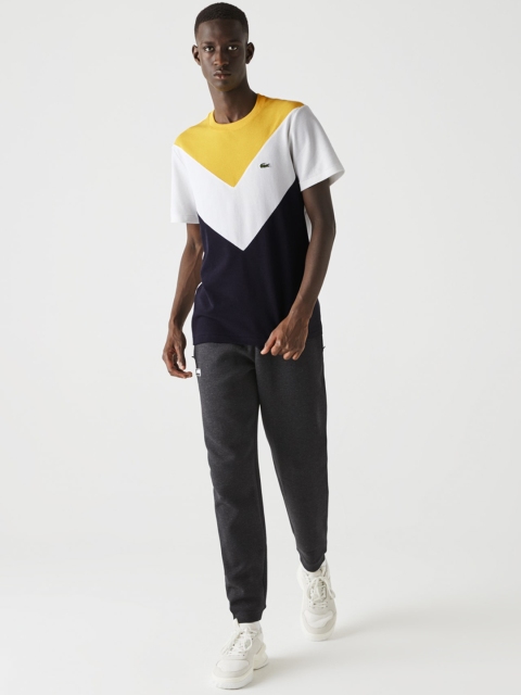

Lacoste Men Yellow & Grey Colourblocked Round Neck T-shirt