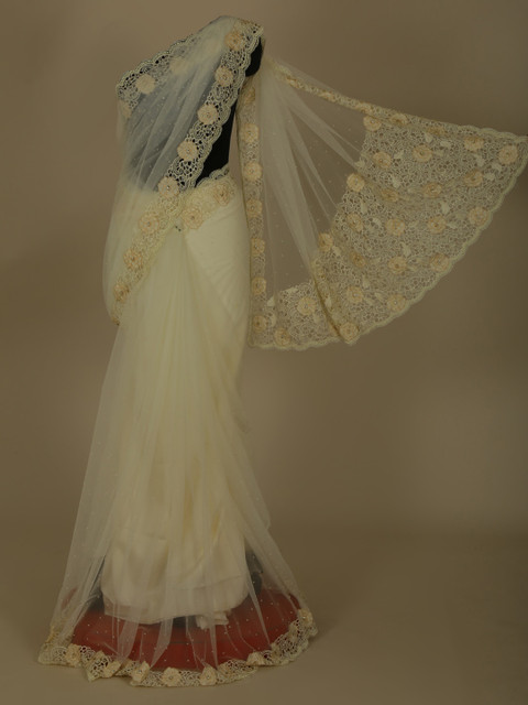 

Pothys Off-White Solid Jute Silk Saree