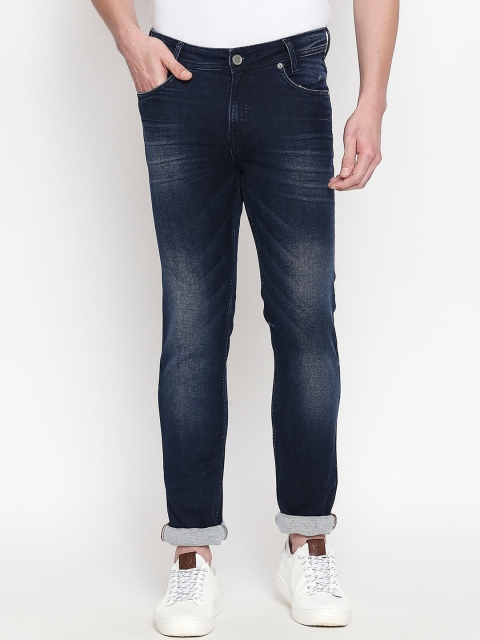 

Mufti Men Navy Blue Regular Fit Mid-Rise Clean Look Stretchable Jeans