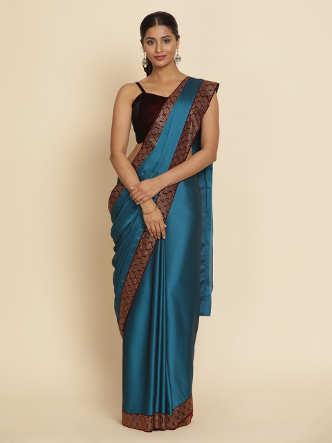 

Koskii Blue Solid Poly Crepe Saree