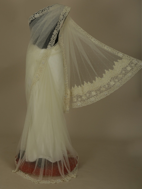 

Pothys Off-White Embellished Jute Silk Saree