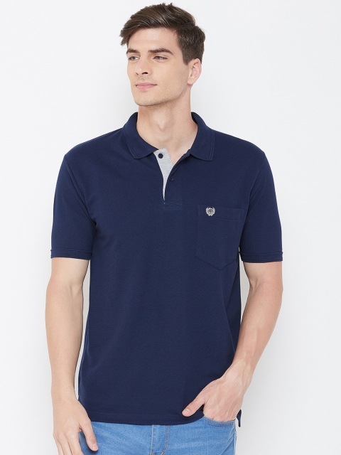 

Duke Men Blue Solid Polo Collar T-shirt