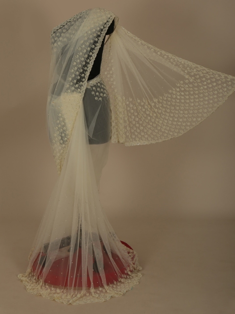 

Pothys Off-White Embellished Jute Silk Saree