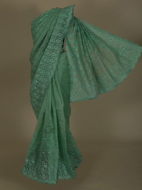 

Pothys Green Embroidered Net Saree