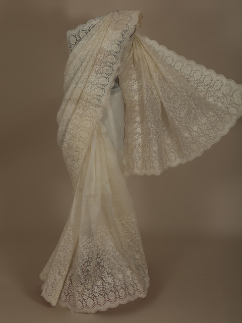 

Pothys Off-White Embroidered Net Saree