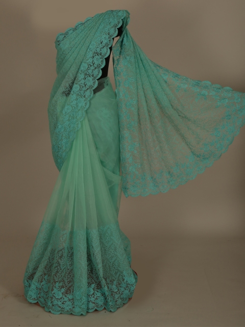 

Pothys Green Woven Design Net Saree