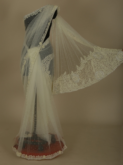 

Pothys Off-White Embellished Jute Silk Saree