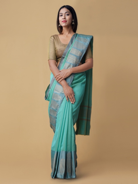 

Unnati Silks Blue Solid Banarasi Saree