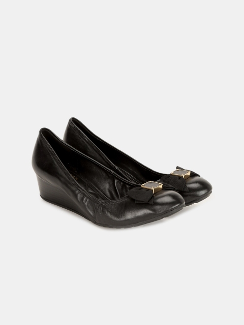 

Cole Haan Women Black Solid Leather Pumps