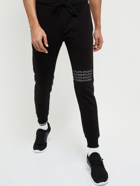 

max Men Black Solid Slim-Fit Joggers
