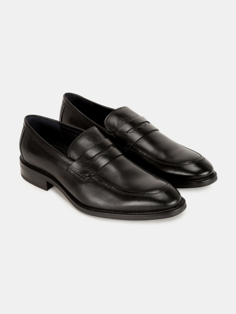 

Cole Haan Men Black Solid Slip On Shoes
