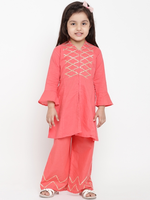 

Bitiya by Bhama Girls Peach-Coloured Solid Kurti with Palazzos