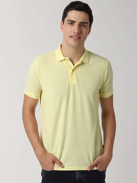

Peter England Casuals Men Yellow Solid Polo Collar T-shirt