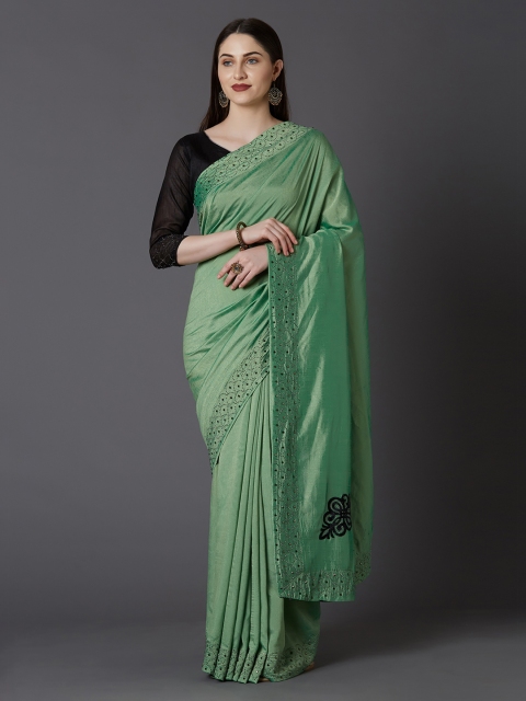 

Mitera Green Embellished Pure Georgette Party Saree