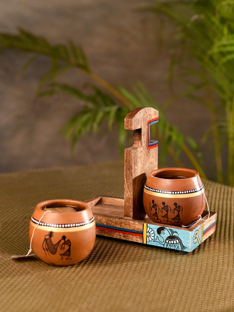 

Unravel India Set of 2 Brown Warli Handpainted Terracotta Kullads With Wooden Holder Stand