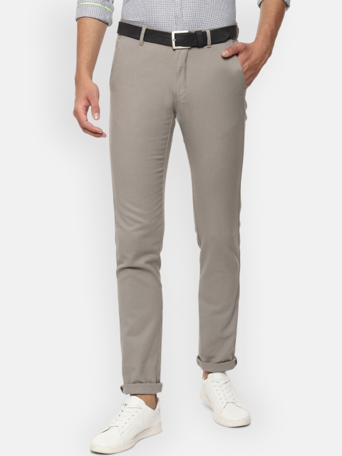 

Van Heusen Sport Men Beige Slim Fit Solid Regular Trousers