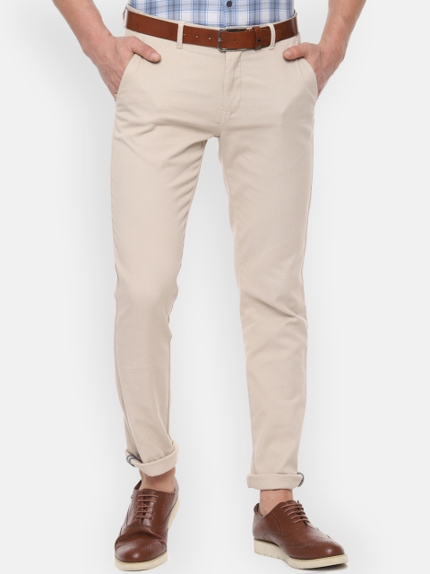 

Van Heusen Sport Men Beige Slim Fit Solid Regular Trousers