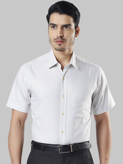 

Raymond Men White Regular Fit Solid Formal Shirt