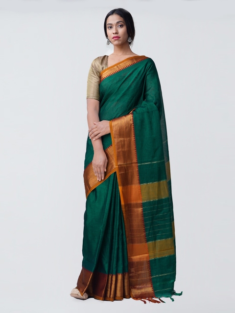 

Unnati Silks Green Pure Cotton Solid Narayan Peth Saree