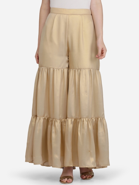 

Ojjasvi Women Gold-Toned Solid Sharara