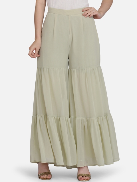 

Ojjasvi Women Green Solid Sharara