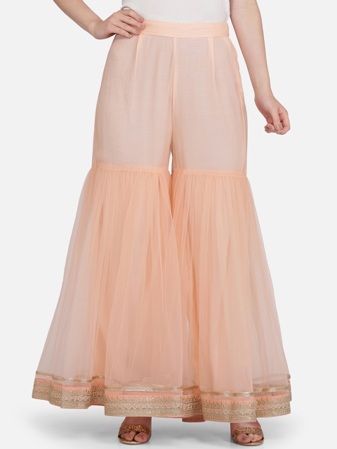 

Ojjasvi Women Peach-Coloured Solid Sharara