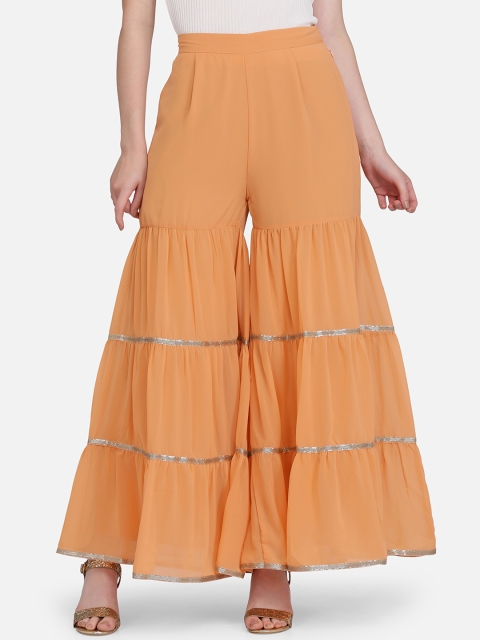 

Ojjasvi Women Orange Solid Sharara