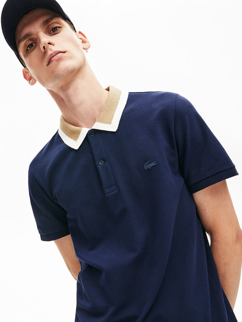 

Lacoste Men Navy Blue Solid Polo Collar T-shirt