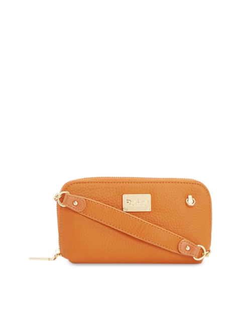 

bebe Orange Textured Leather Sling Bag