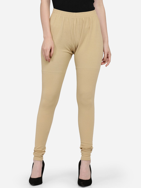 

Ojjasvi Women Beige Solid Churidar-Length Leggings