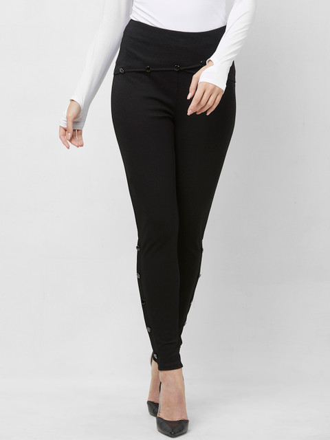 

bebe Women Black Solid Treggings