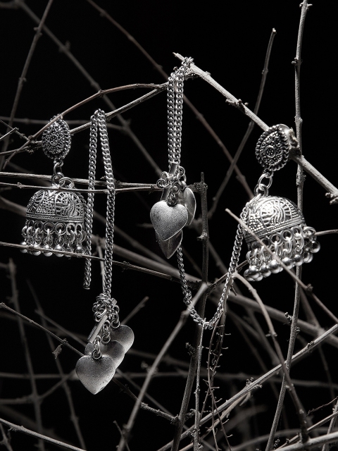 

ZeroKaata Silver-Toned Oxidised Dome Shaped Jhumkas