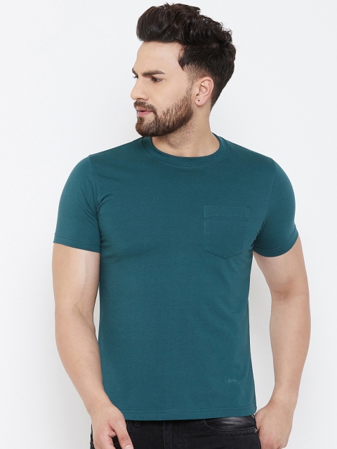 

Adobe Men Teal Blue Solid Round Neck T-shirt